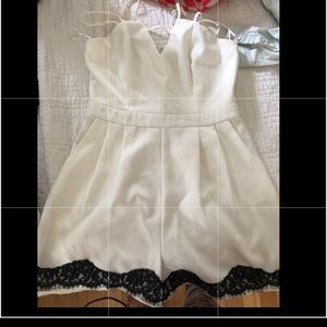 Jealous Tomato White Romper with lace accent M